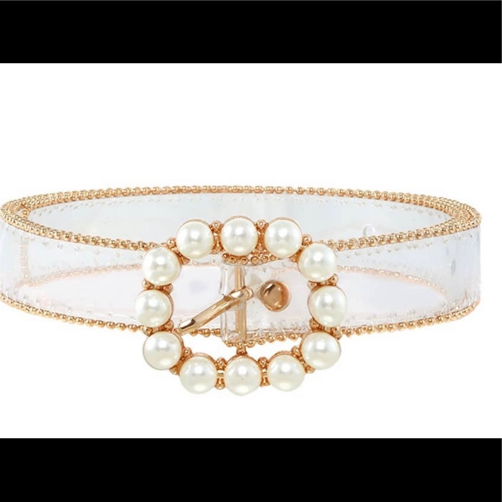 Clear see-through women’s belt with pearl accent.